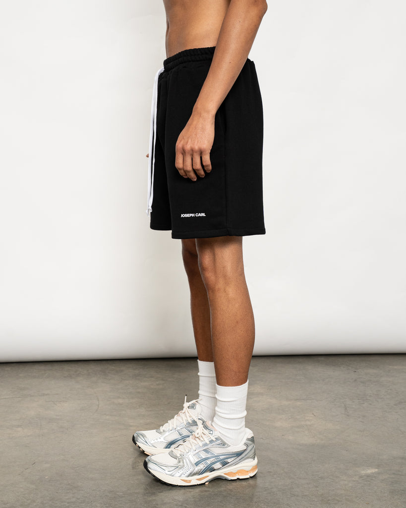 Men’s oversized black sweat shorts - JOSEPH CARL French terry cotton, above-the-knee fit