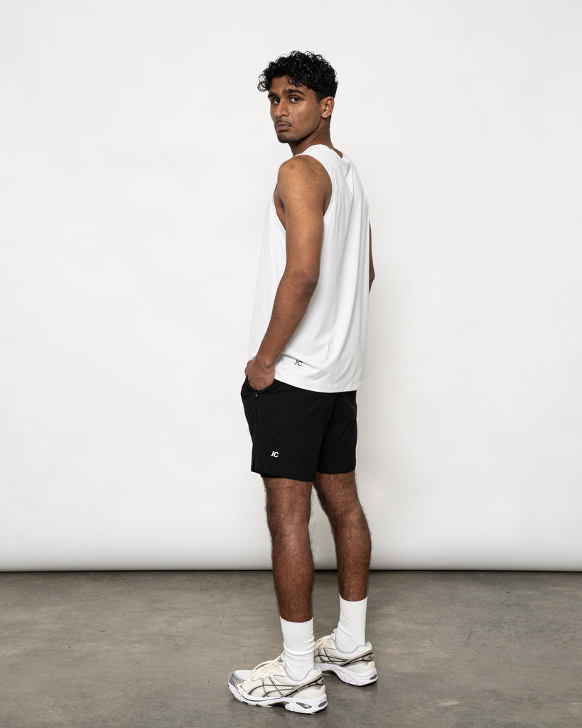 Men’s white training singlet – JOSEPH CARL luxury sportswear with breathable stretch fabric